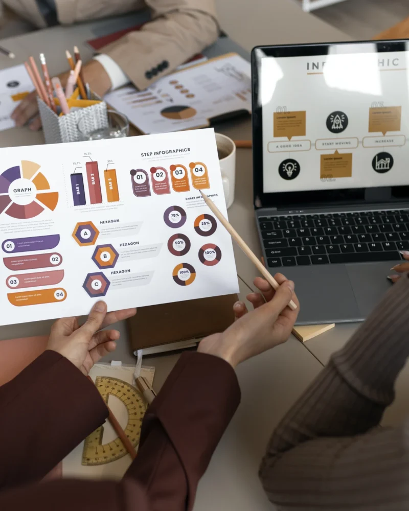 high-angle-people-working-with-laptop